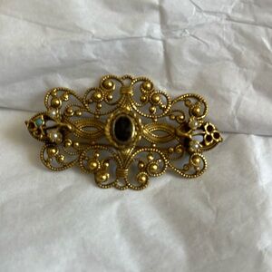 Victoria golden brooch